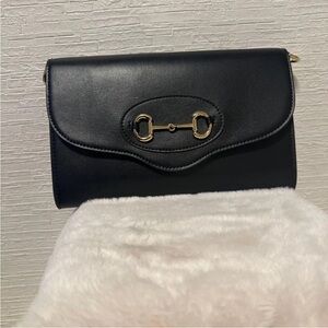 Gucci Black Leather Clutch with Gold Detail